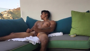 BarebackLatinoz: Erotic Erick oiled stroking on sofa