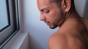 Latin Leche: Toned Antuan's Tease in Short Shorts on Beach